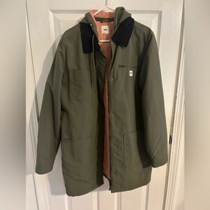 Vans green mid length jacket with pink quilted lining.
